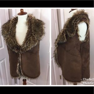 Chico’s furry vest.